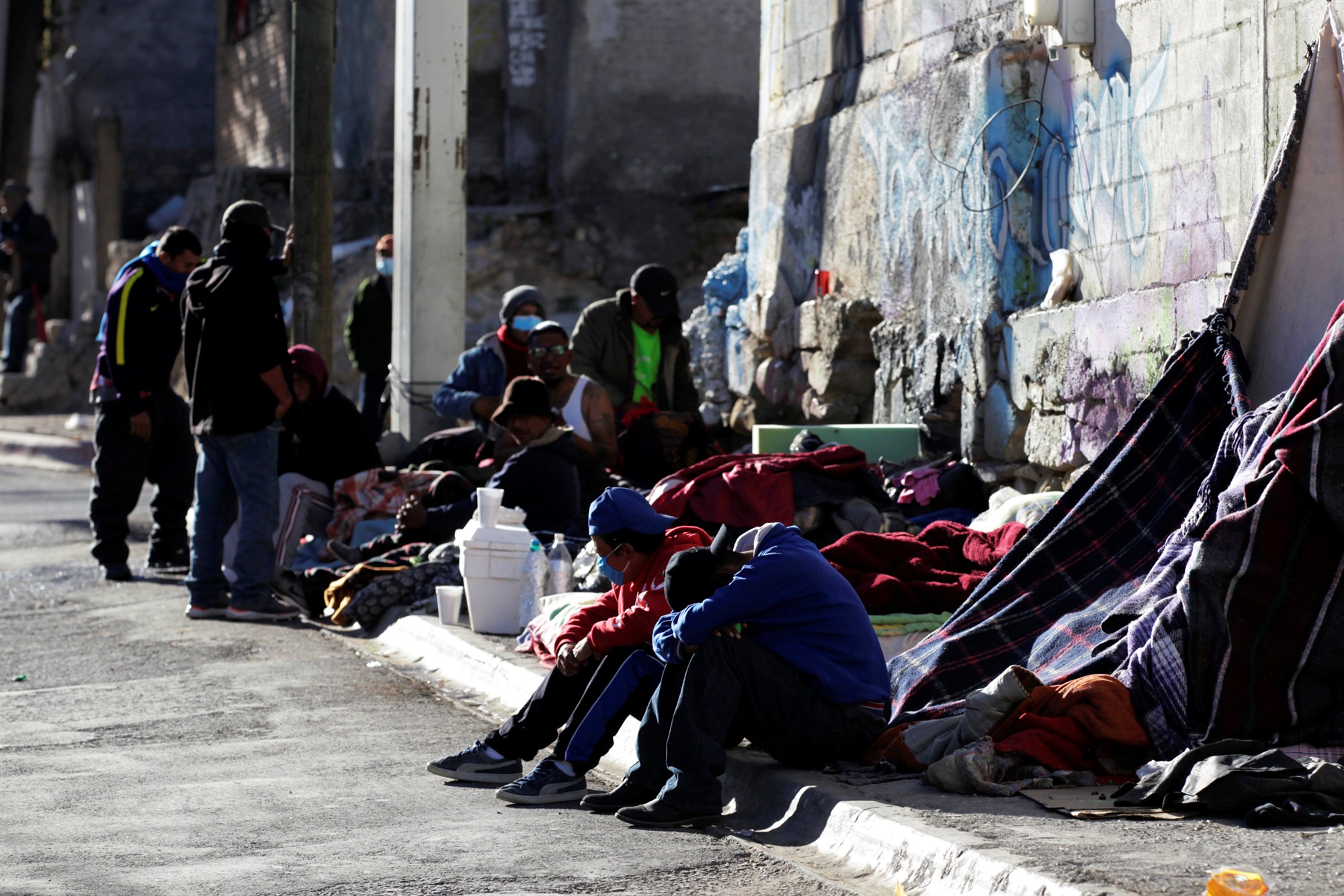As Mexico closes migrant shelters due to coronavirus, those seeking refuge face more dangers